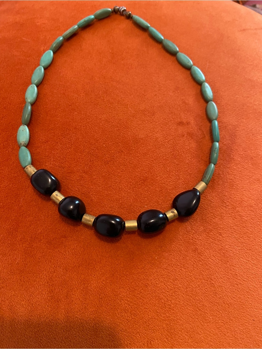 Turquoise colored beads, Raw Brass, and Black Beaded Necklace with Gold BAccents